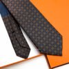 Hermes Navy Orange Maillons Parade Soft Silk Tie
