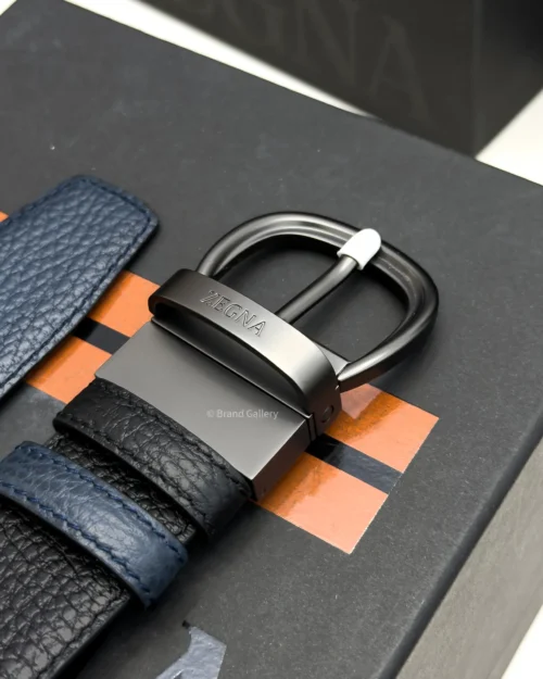 Zegna reversible black and navy blue grained leather belt with matt gun-metal buckle