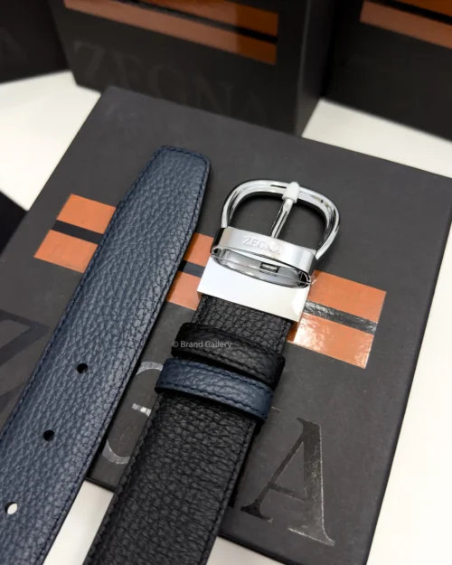 Zegna reversible black and navy blue grained leather belt with shiny silver buckle