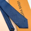 Blue Micro Damier silk tie with navy and bright blue geometric check pattern