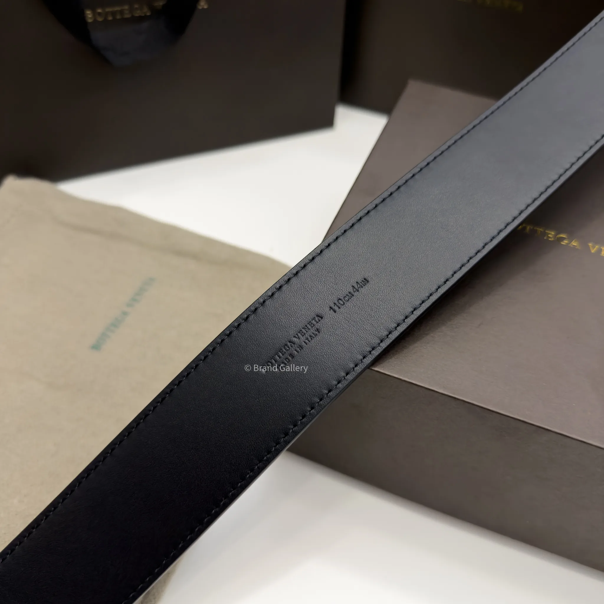 Bottega Veneta black Intrecciato woven leather belt with matte gunmetal-tone buckle